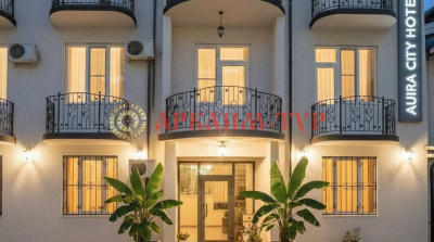 Главный корпус отеля Aura City Hotel в центре Гагры с балконами и ухоженной территорией - ж/д тур в Абхазию 2026."

"Двухместный номер с современной мебелью, кондиционером и телевизором в Aura City Hotel - тур на поезде в Гагру 2026."

"Уютный внутренний дворик отеля Aura City Hotel с зоной отдыха - Абхазия тур 2026."

"Галечный пляж Гагры в 2 минутах ходьбы от отеля Aura City Hotel - ж/д тур в Абхазию 2026."

"Приморский парк Гагры рядом с отелем Aura City Hotel - прогулки и достопримечательности в туре 2026."

"Ванная комната в номере отеля Aura City Hotel с душевой кабиной - комфорт в Гагре 2026."

"Вид из окна отеля Aura City Hotel на центральные улицы и горы Гагры - живописные пейзажи Абхазии 2026."

"Гостиная зона в номере отеля Aura City Hotel - уютная атмосфера для отдыха 2026."